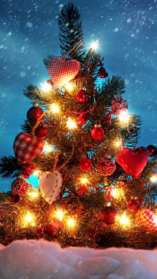 Christmas tree lights ornaments snowy - a blue sky background free wallpaper for mobile