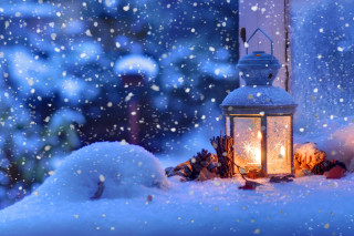 Lantern lit snow window falling - the snow outside free wallpaper