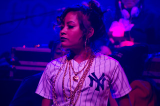 Woman necklace baseball jersey room - movie still free wallpaper