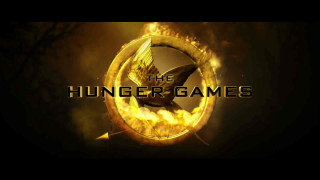 Hunger games tv series logo - a fireball in the background free wallpaper