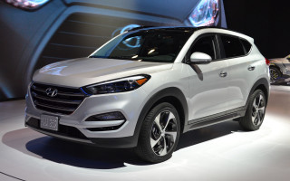 White car showroom display large - display free wallpaper