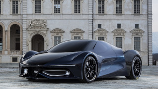 Futuristic car parked large building - concept design free wallpaper