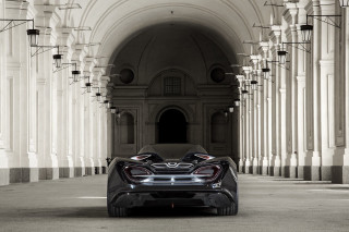 Car parked tunnel buildings columns - side of it free wallpaper