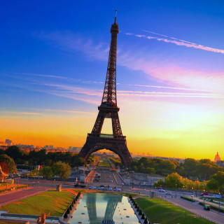 Eiffel tower lit up sunset 3 - didier mouron free wallpaper for tablet