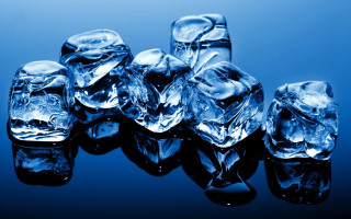 Ice cubes blue surface water - a blue surface free wallpaper