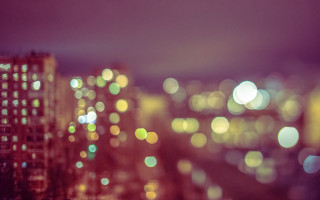 Blurry city night lights buildings - bokeh free wallpaper