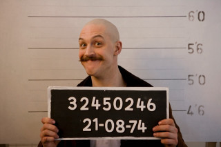 Man holding sign mustache mugshot - a mustache free wallpaper