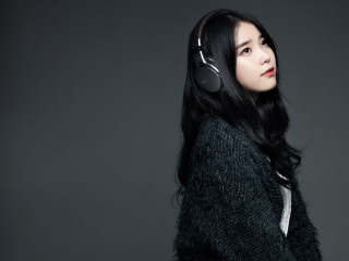 Woman headphones looking up dark - headphone free wallpaper