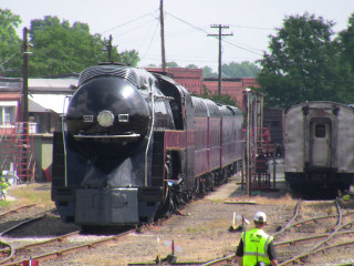 Train parked tracks yellow vest - a train free wallpaper