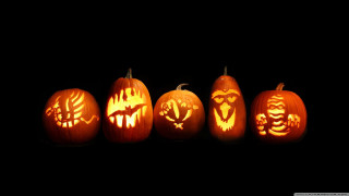 Carved pumpkins with faces group - free halloween wallpaper