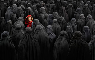 Woman red hoodie surrounded black - a dark room free wallpaper