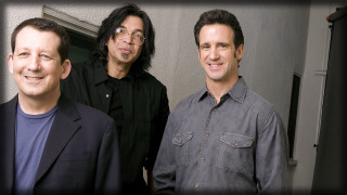 Three men standing building door - eric peterson free wallpaper