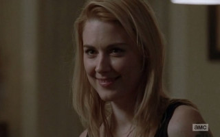 Woman blonde hair black top - seductive smile free wallpaper