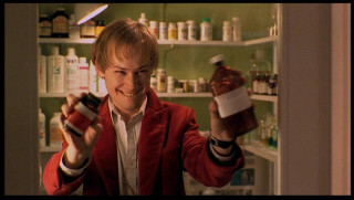 Man holding bottle pharmacy shelves - epic scene free wallpaper