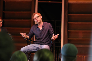 Man sitting chair woman blackshirt - a black shirt and jeans free wallpaper