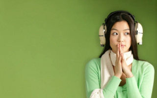 Woman headphones scarf covering hands - her mouth free wallpaper