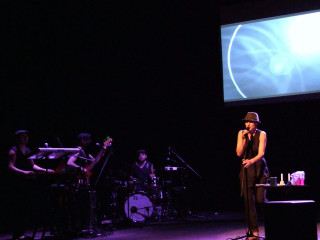 Woman stage microphone band screen - a screen free wallpaper