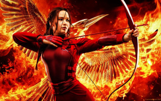 Woman red outfit bow arrow - a fire background free wallpaper