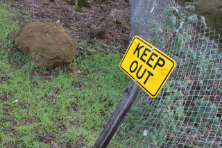 Yellow keepout sign fenced hill - hill free wallpaper