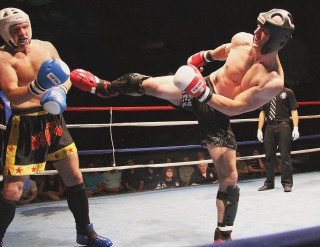 Boxing match crowd stands kick - two man free wallpaper