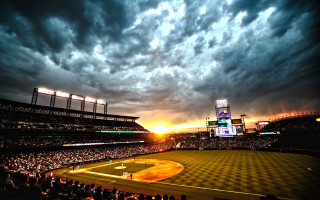Baseball field cloudy sky sunset - a baseball field free wallpaper
