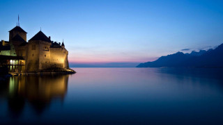 Castle lake mountains nighttime light - enguerrand quarton free wallpaper