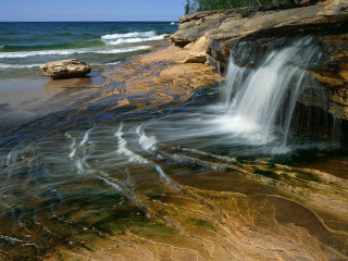 Waterfall beach rocks trees sky - the shore free wallpaper