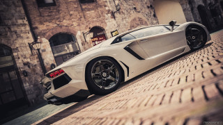 White sports car brick road 2 - a brick road in front free wallpaper
