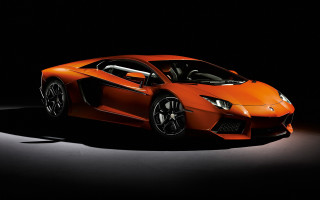 Orange sports car dark room 16 - nice looking orange sports car free wallpaper