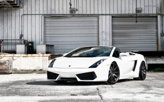 White sports car building open - a door open free wallpaper