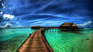 Tropical island pier hut clear - a wooden pier free wallpaper