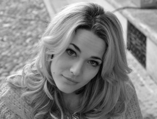 Woman bench eyes closed sweater - a sweater free wallpaper