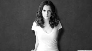 Woman white shirt leaning wall - anne ryan free wallpaper