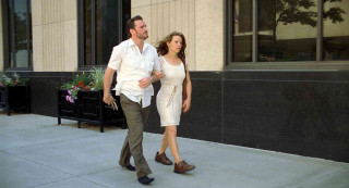 Man woman walking sidewalk building - a planter free wallpaper