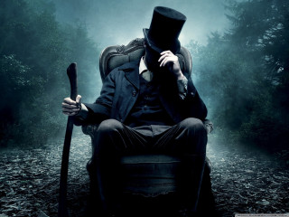 Man top hat coat sitting 3 - a man in a top hat free wallpaper