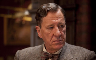 Man suit bowtie serious look - a man in a suit and bow tie free wallpaper