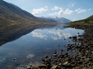 Mountain lake rocks water sky - a mountain lake free wallpaper