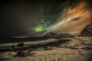 Green aurora ocean mountains beach - a green aurora free wallpaper
