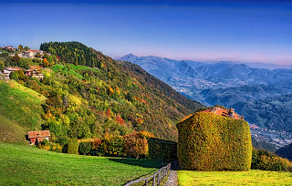 Scenic mountain house hill valley - a scenic view of a mountain free wallpaper