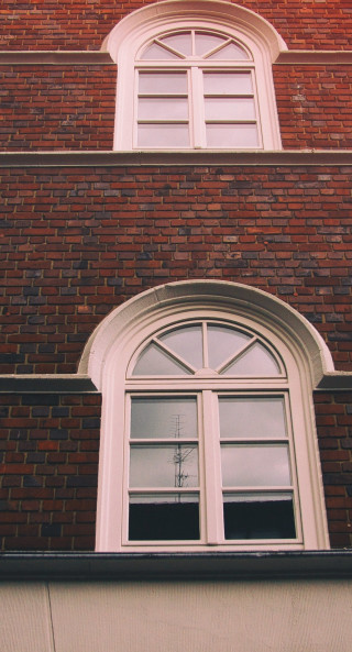 Clock brick building tower tree - free architecture wallpaper for mobile