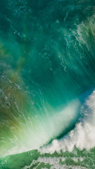 Green ocean wave surfer standing - a wave free wallpaper for mobile