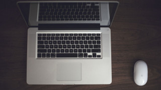 Laptop wooden desk mouse mousepad - a laptop computer free wallpaper