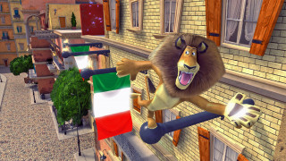 Lion jumping railing city street - a lion free wallpaper for desktop