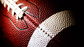 Football closeup black background white - clear eye free wallpaper