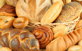 Basket filled breads rolls table - lot free wallpaper for desktop