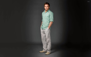 Man green shirt grey pants - his hands in his pockets free wallpaper
