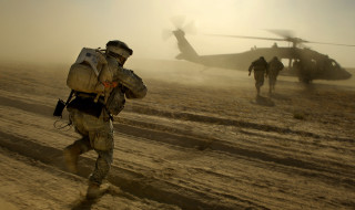 Soldiers walking dirt field helicopter - a dirt field next free wallpaper