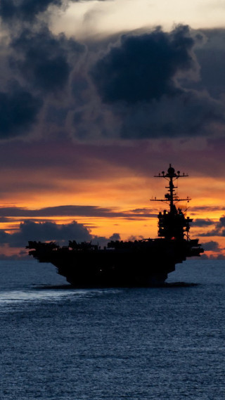 Large ship ocean sunset clouds - a large ship in the middle of the ocean free wallpaper