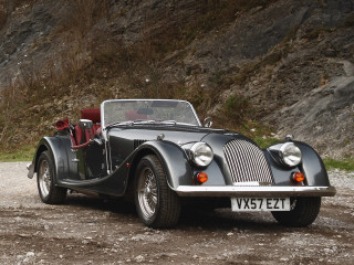 Vintage car gravel road mountain - a vintage car free wallpaper