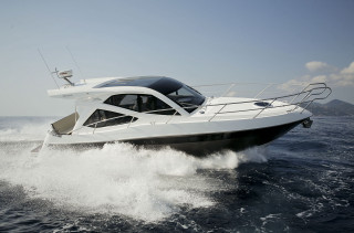 White boat sunny mountain ocean - a white boat free wallpaper